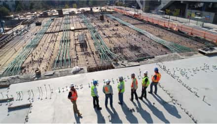 workers looking at construction site